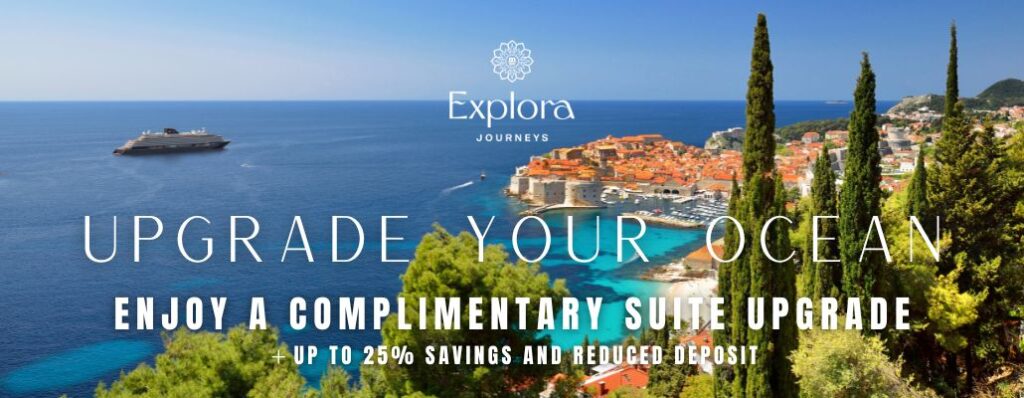 cruise ship off coast of Mediterranean town