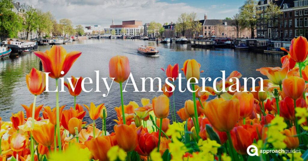 view of Amsterdam with tulips by Amstel Cancal