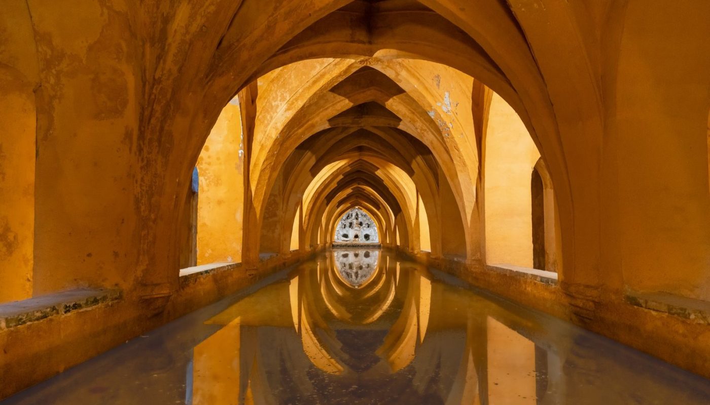 Reflective arches in the Baths of Maria de Padilla, Alcázar of Sevilla.