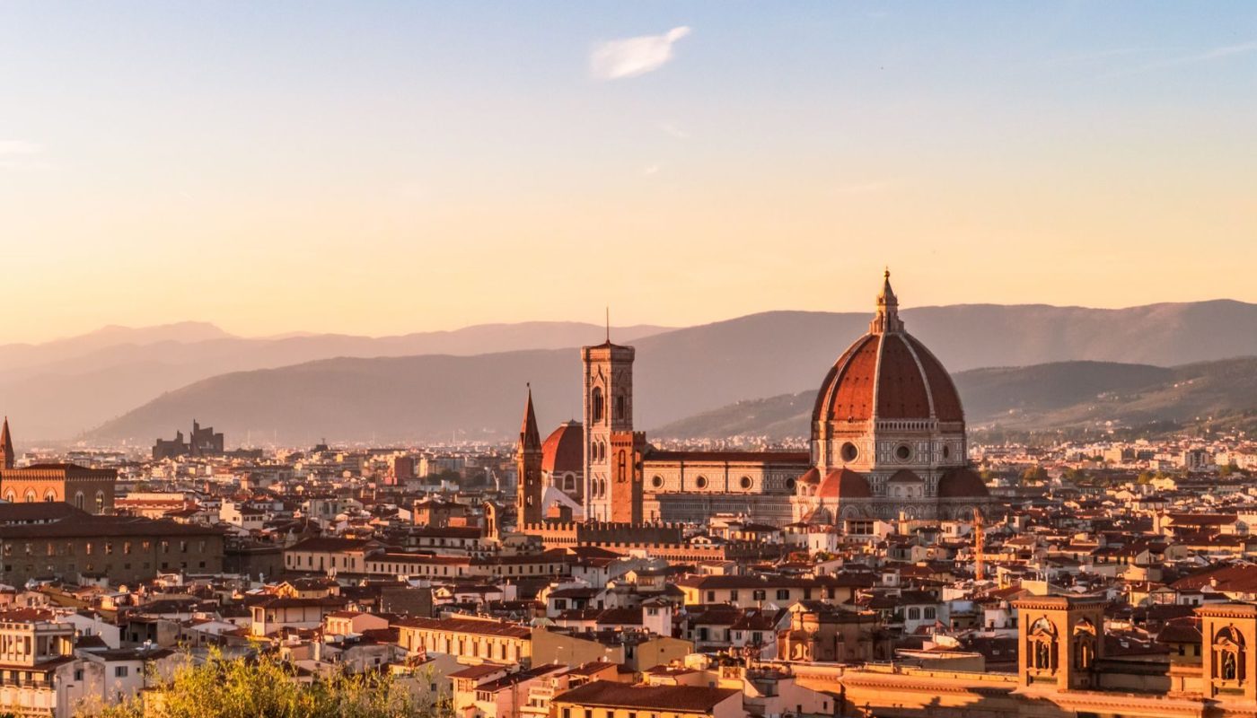 Captivating sunset over Florence, showcasing the iconic Duomo and Tuscan skyline.