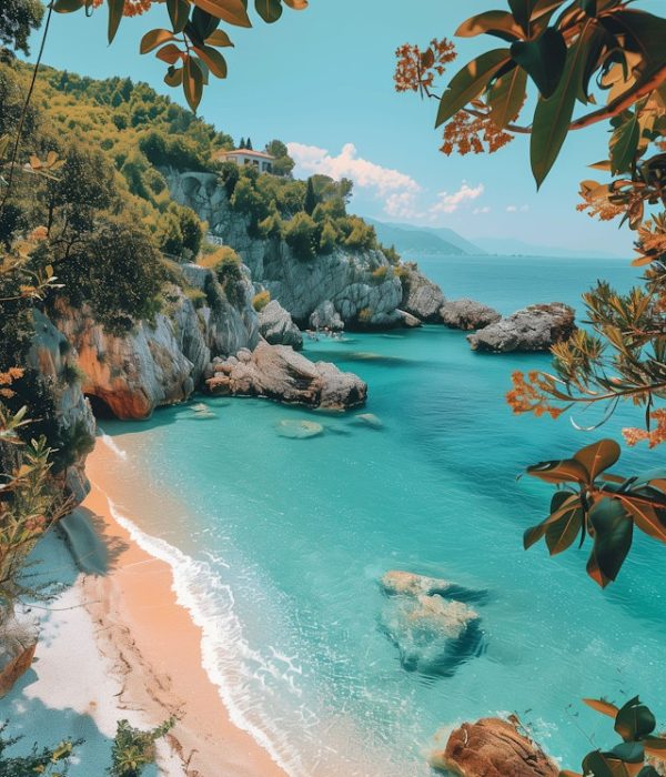 crystal blue water against beach and rocks